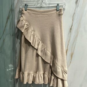 Nude waffle skirt with asymmetrical design